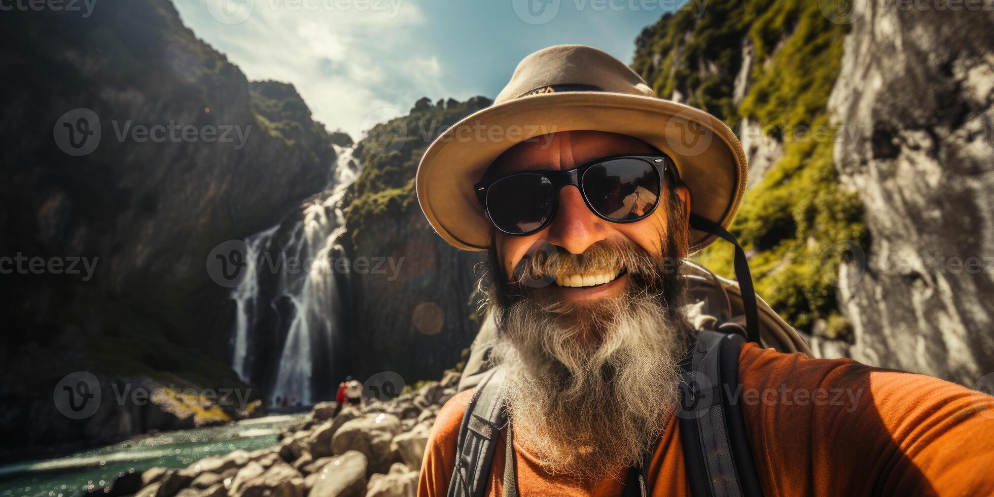 Happy man in a hat takes a selfie in nature. Travel theme. photo