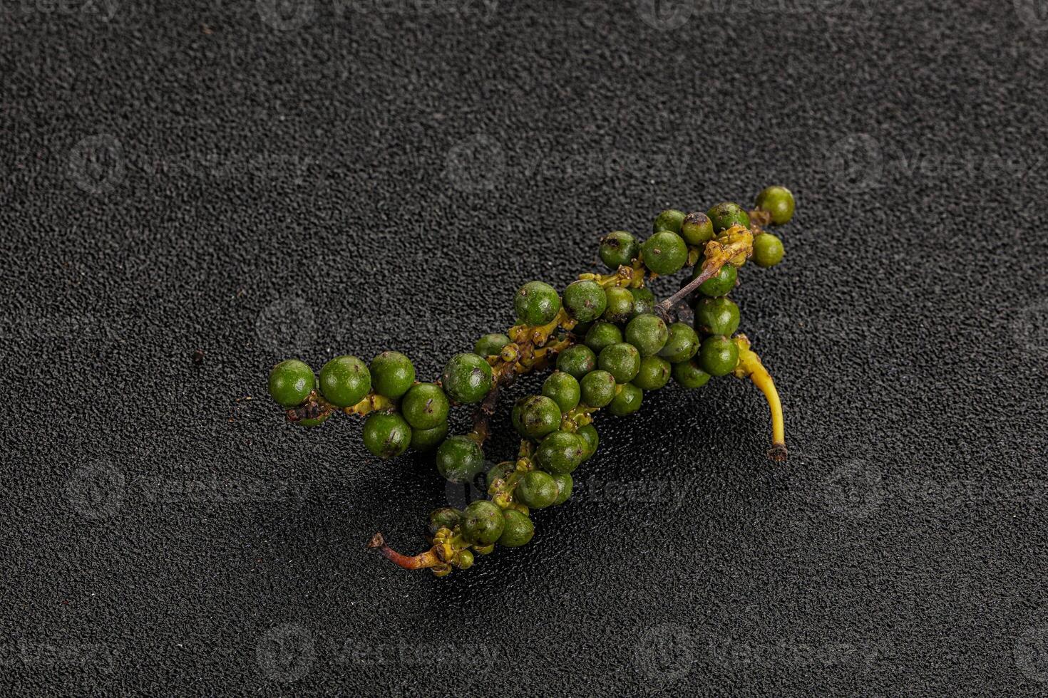 Green pepper corn heap isolated photo