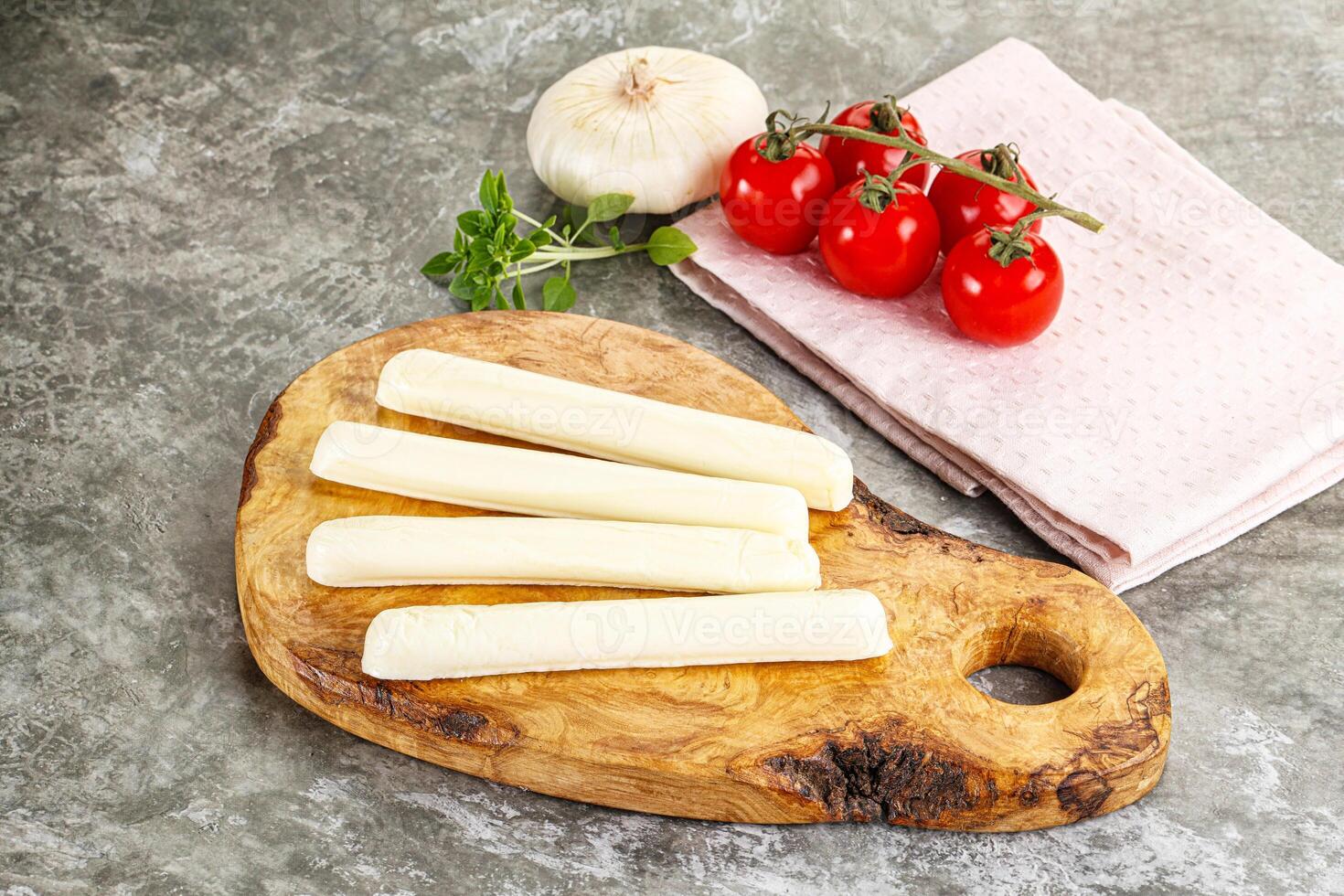 Mozzarella cheese stick heap snack photo
