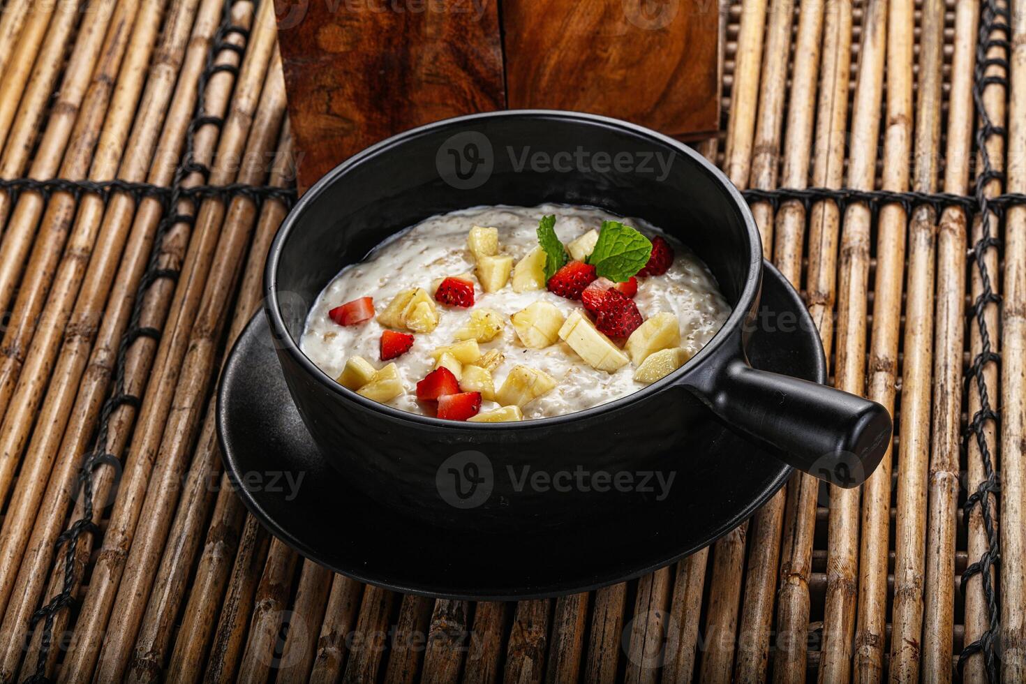 Breakfast sweet porrige with banana photo