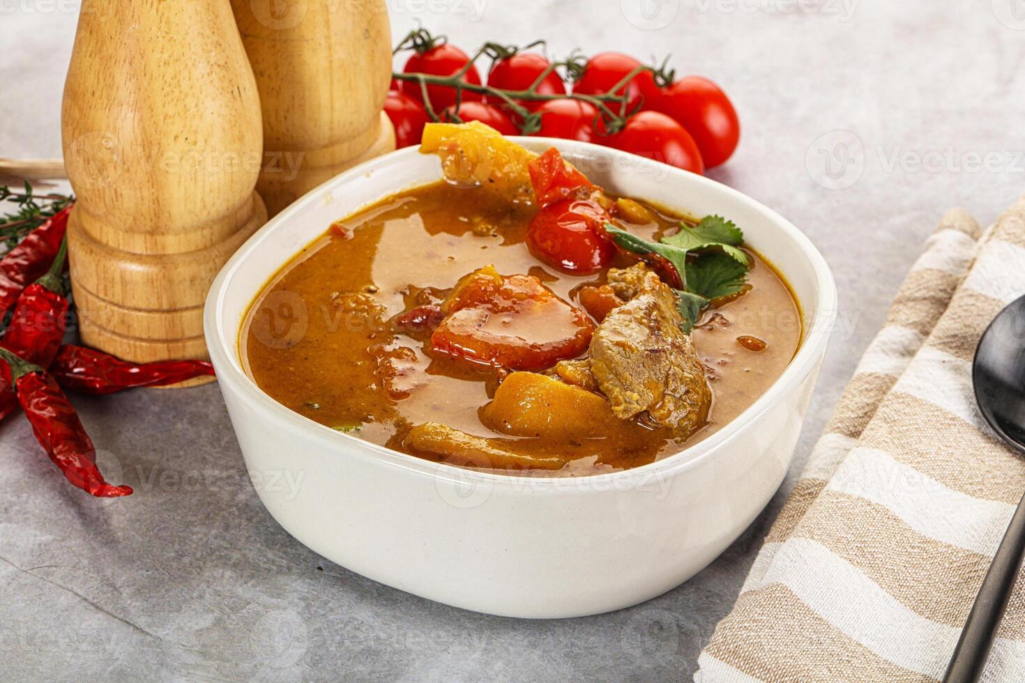 Yellow Thai curry with beef photo