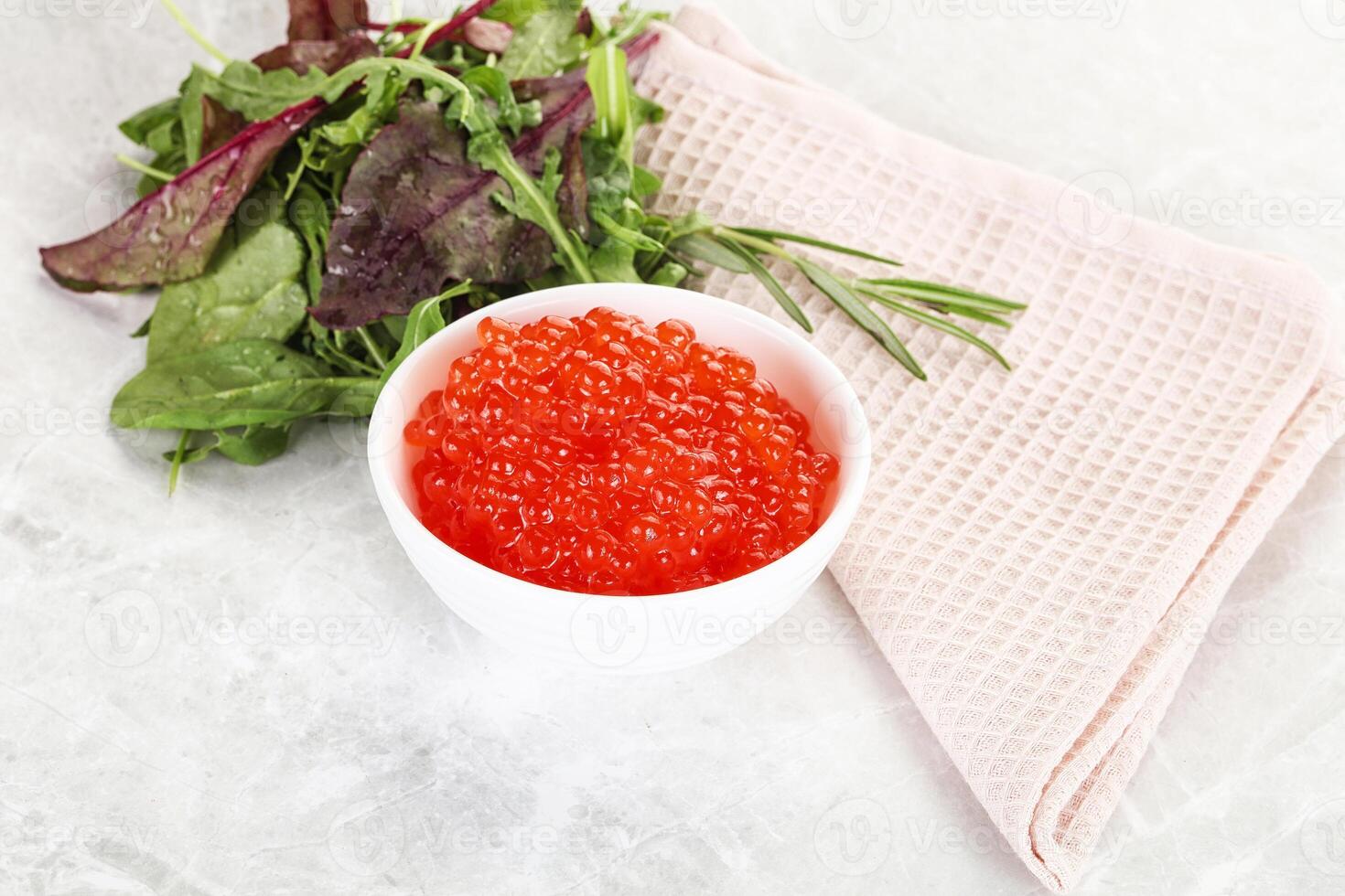 Red caviar in the bowl photo