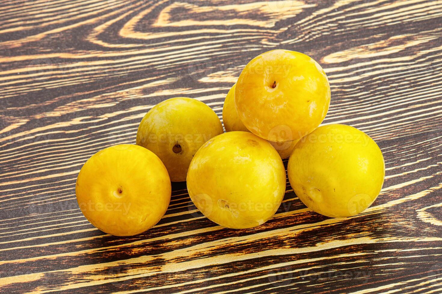 Yellow sweet plum heap fruit photo