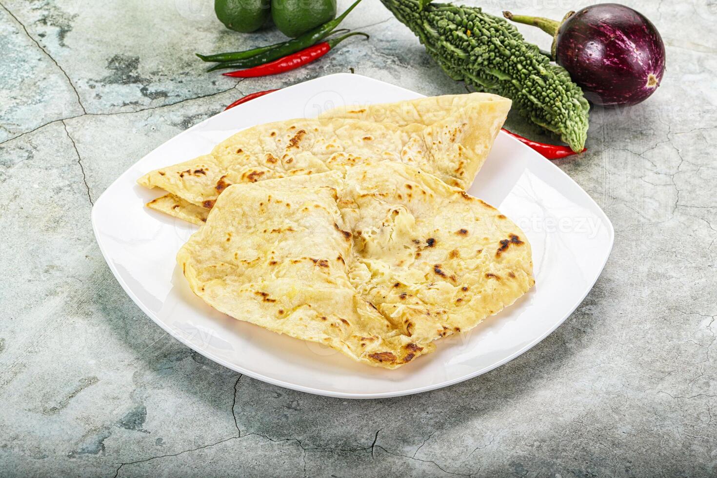 Indian tandori bread - naan with cheese photo