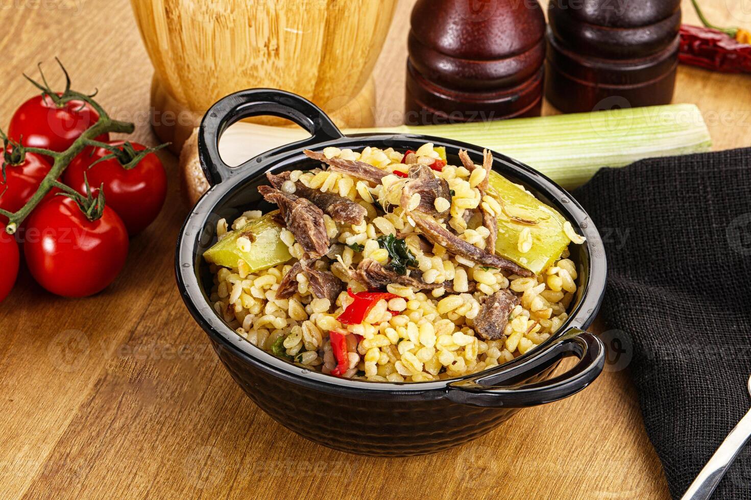 Bulgur with lamb and vegetables photo