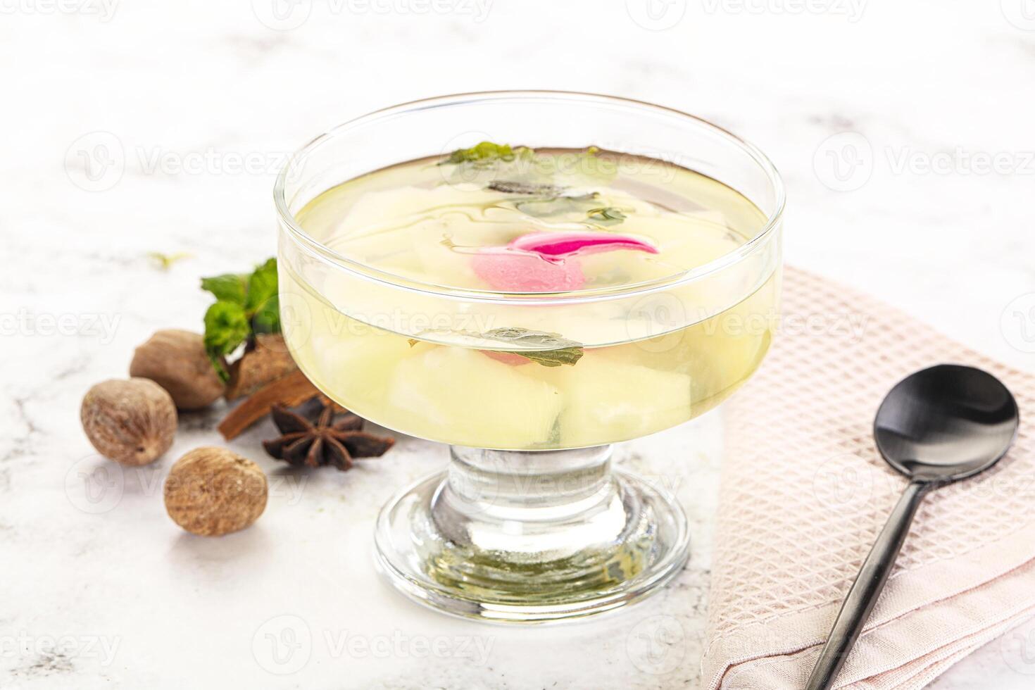Sweet pineapple jelly with mint photo