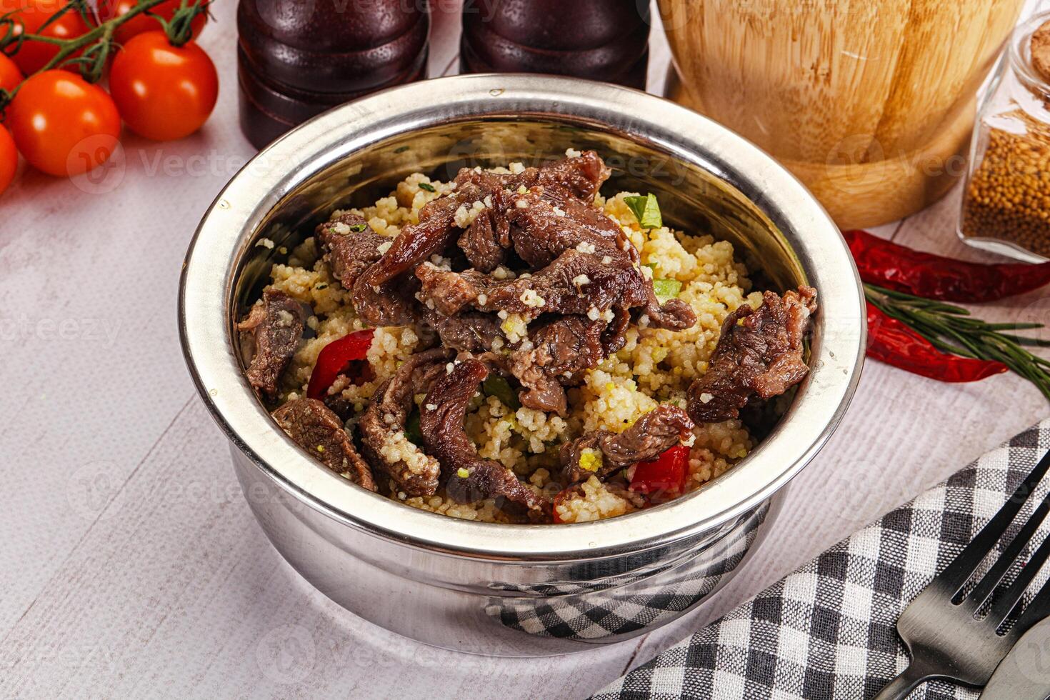 Traditional couscous with beef and vegetables photo