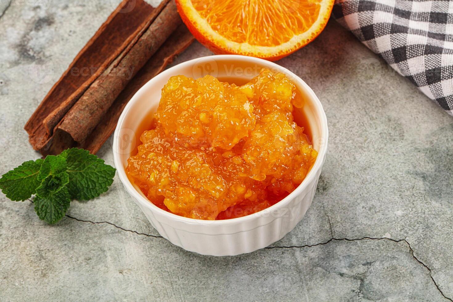 Tasty homemade Orange jam in the bowl photo
