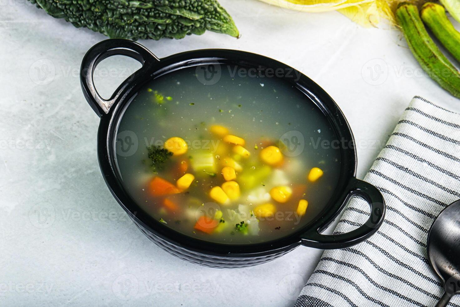 Soup with corn and broccoli photo
