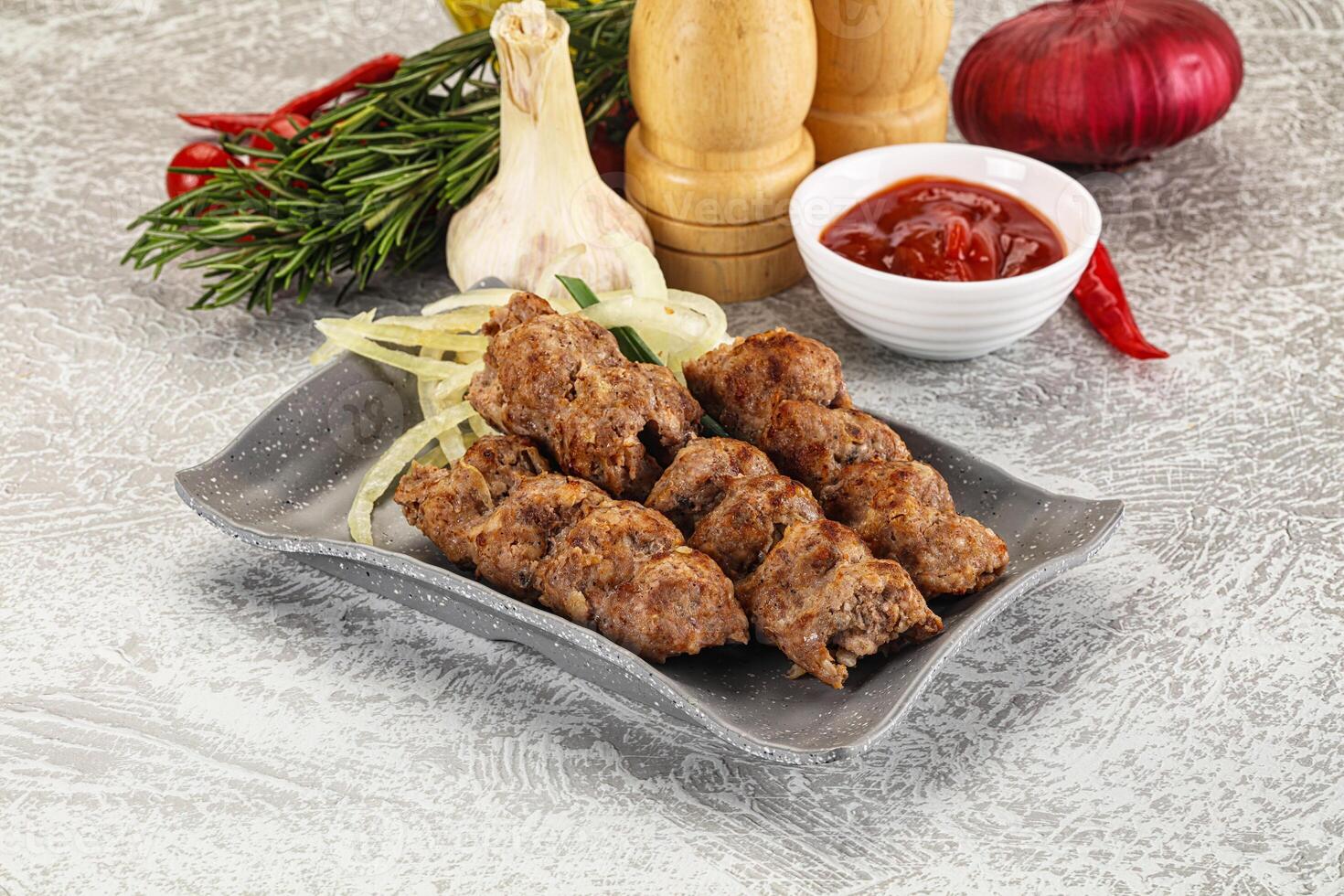 Beef kebab minced meat with onion photo