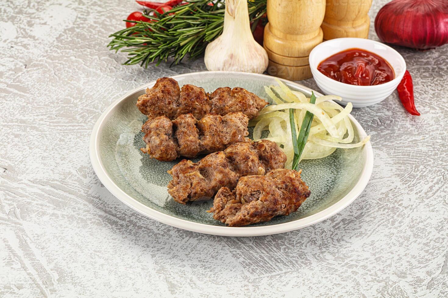 Beef kebab minced meat with onion photo