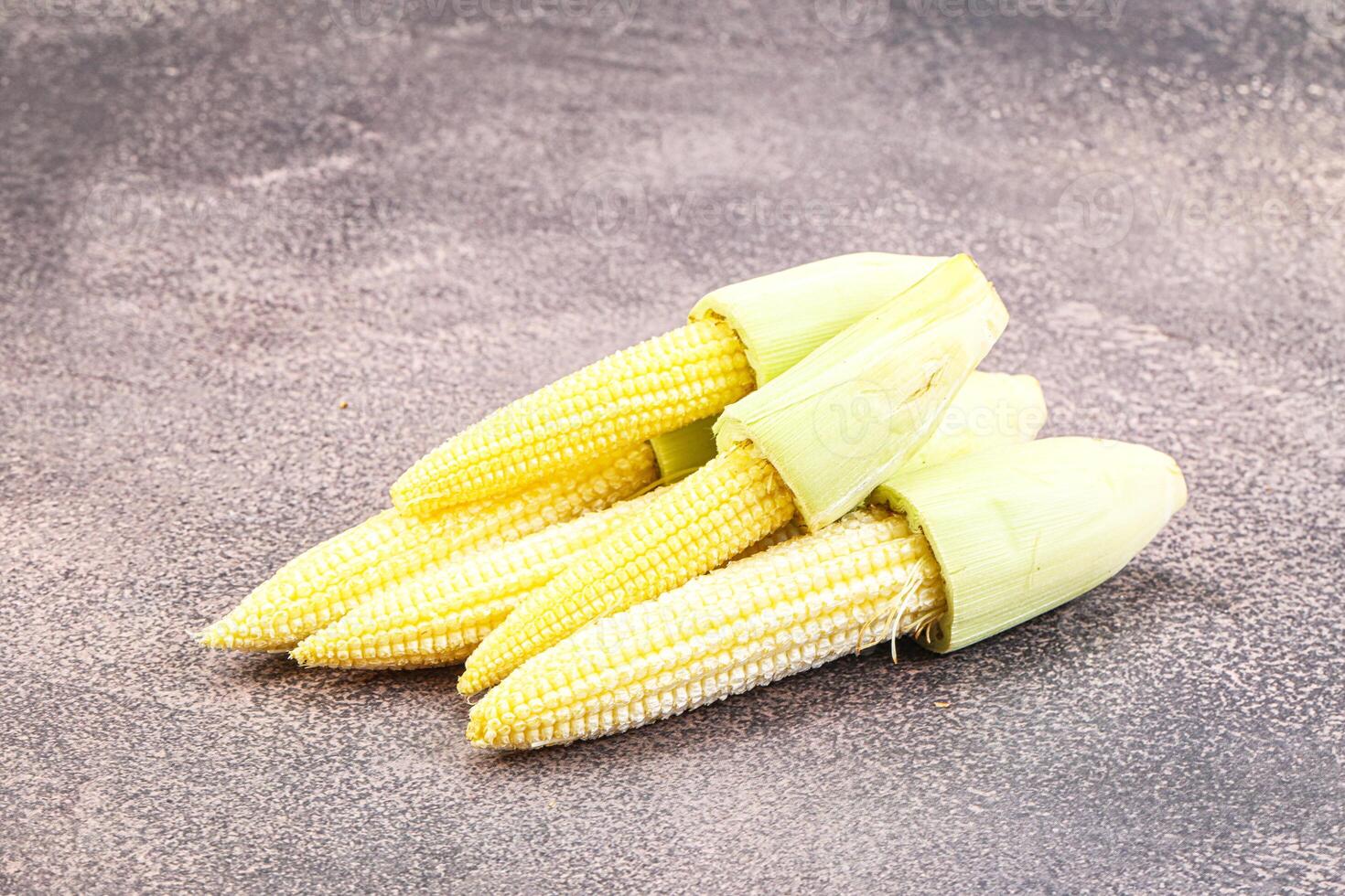 Small young baby corn heap photo