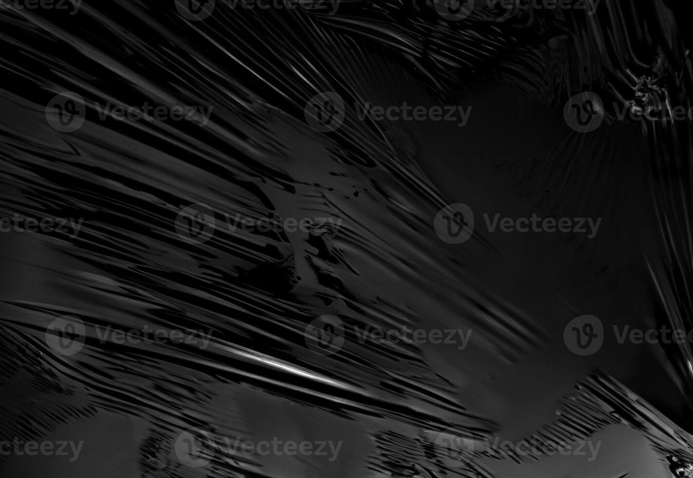 Wrinkled Plastic Wrap Texture on Black Background, Realistic Overlay for Creative Design photo