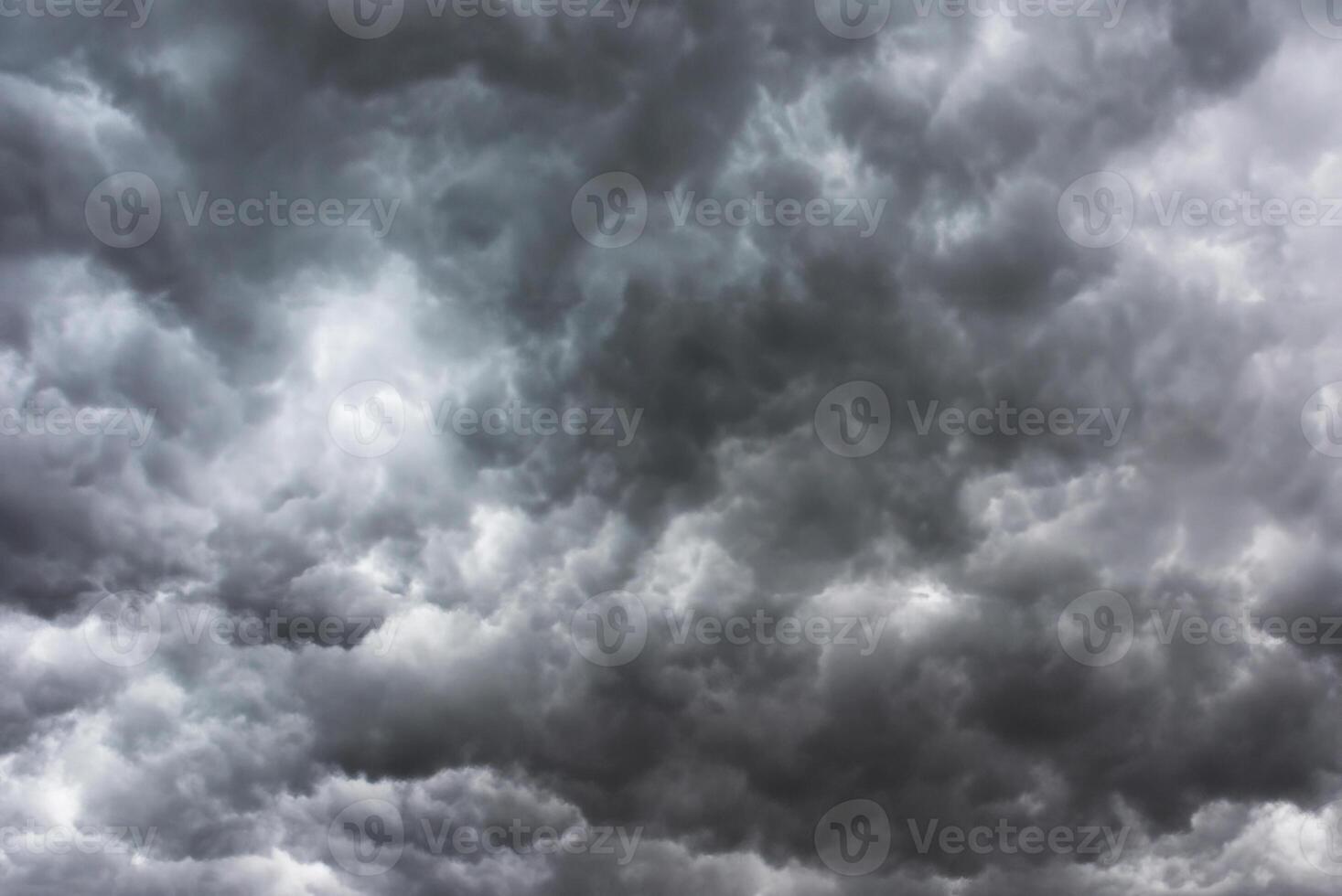 Ominous Storm Clouds Gathering Before Torrential Rainstorm photo