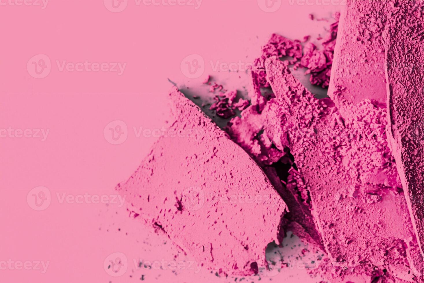 Close-Up of Pink Eyeshadow Palette with Crushed Cosmetics Texture photo