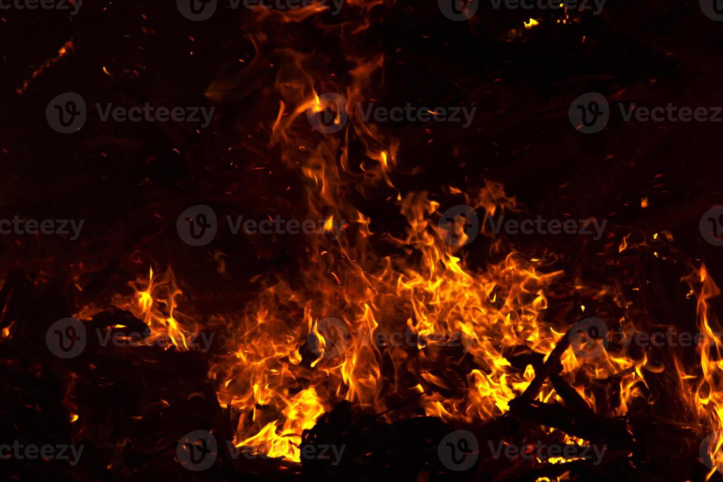 The movement of the flames in the dark photo