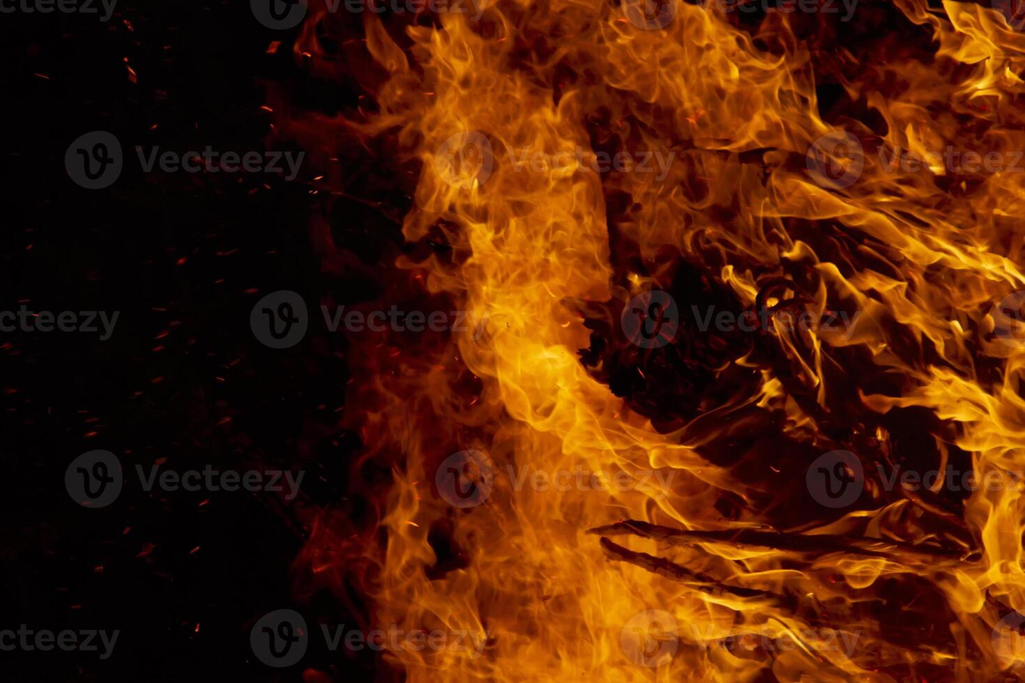 The movement of the flames in the dark photo