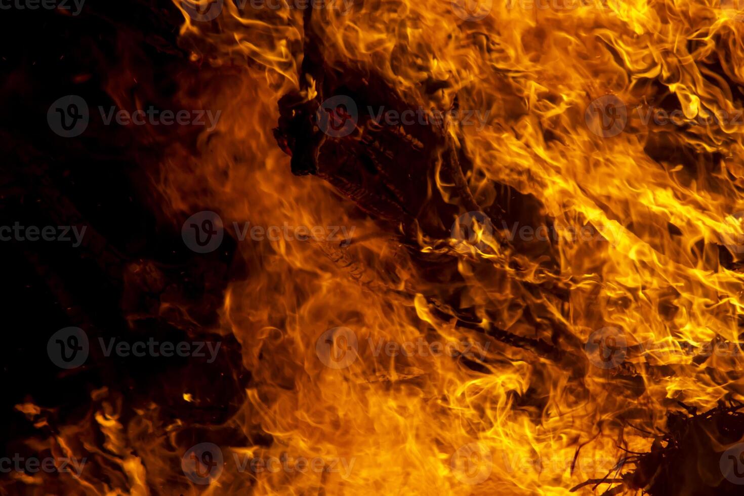 The movement of the flames in the dark photo
