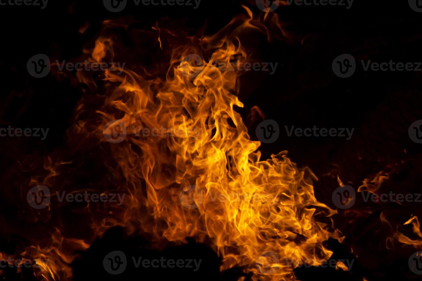 The movement of the flames in the dark photo