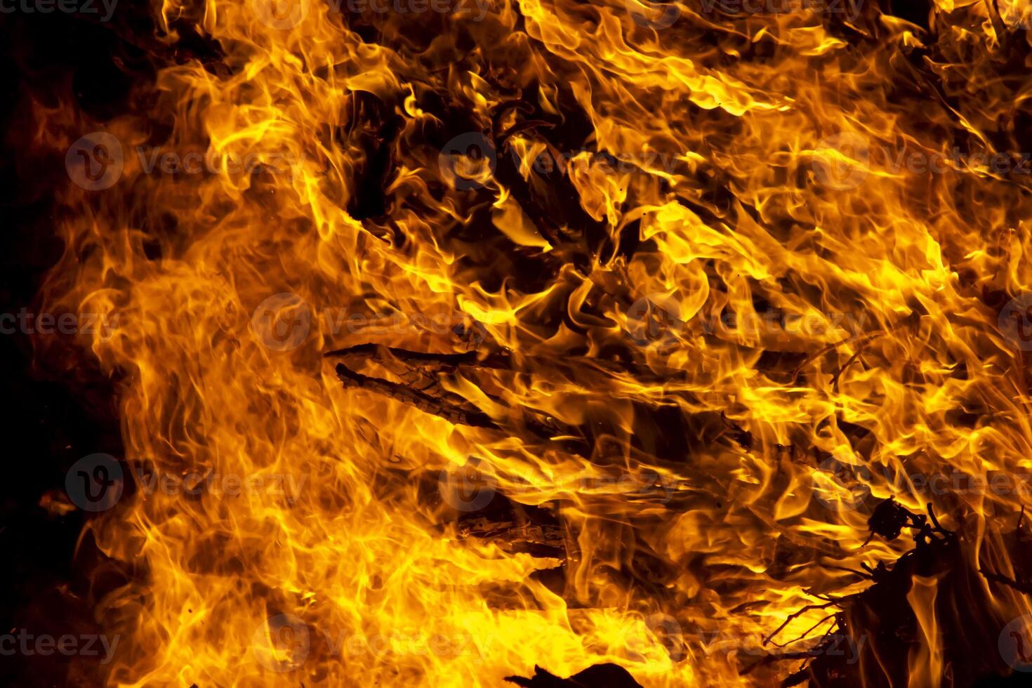 The movement of the flames in the dark photo