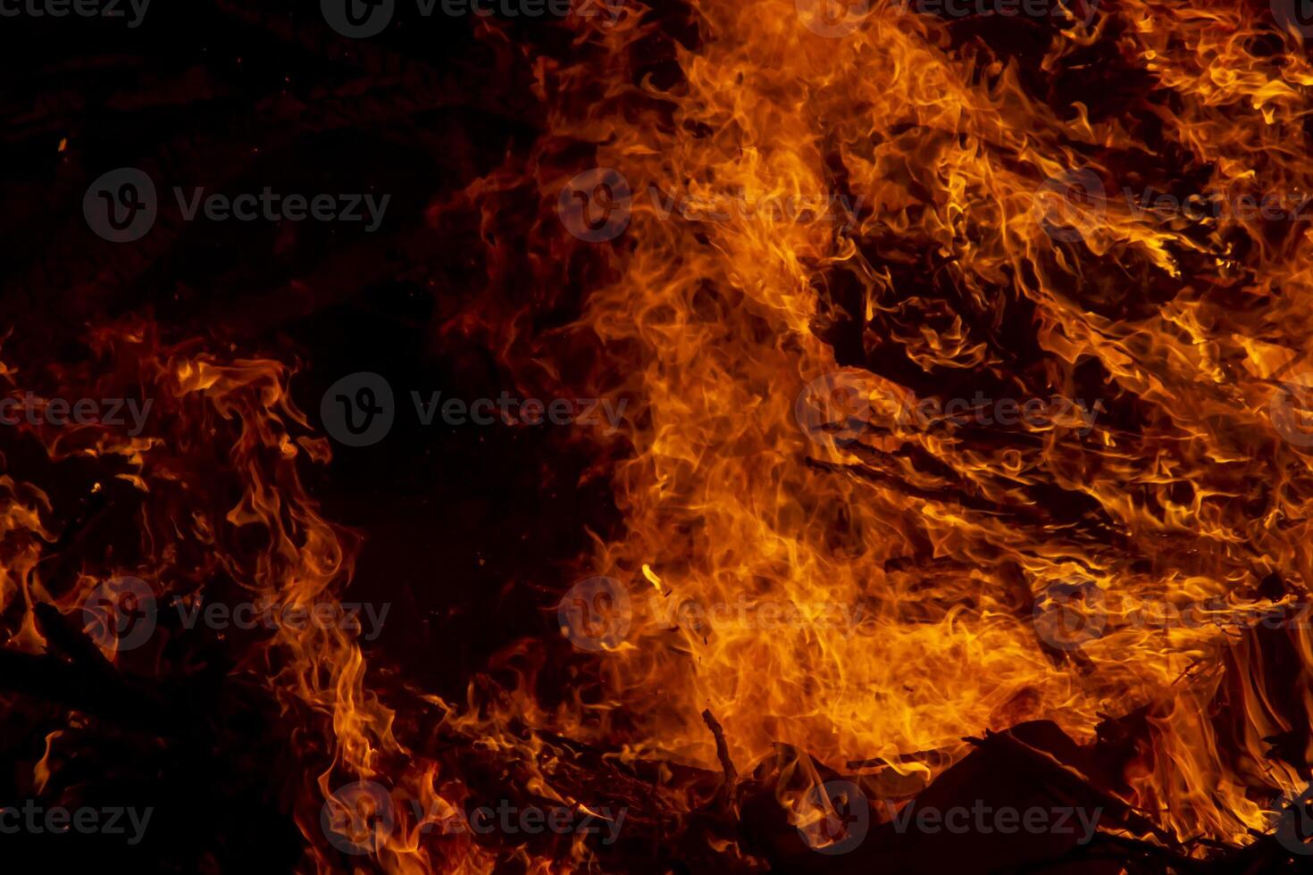 The movement of the flames in the dark photo