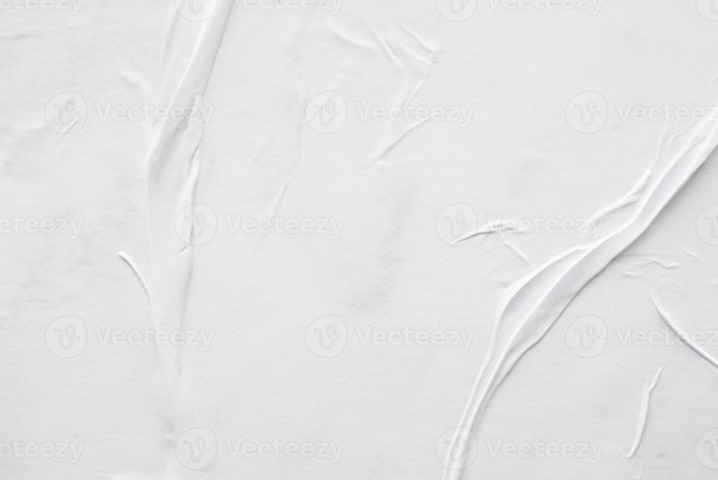 Textured White Paper Poster Background with Crumpled and Creased Surface photo
