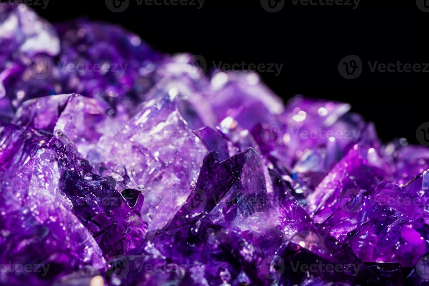 Close-up of Healing Amethyst Crystal with Selective Focus on Black Background photo