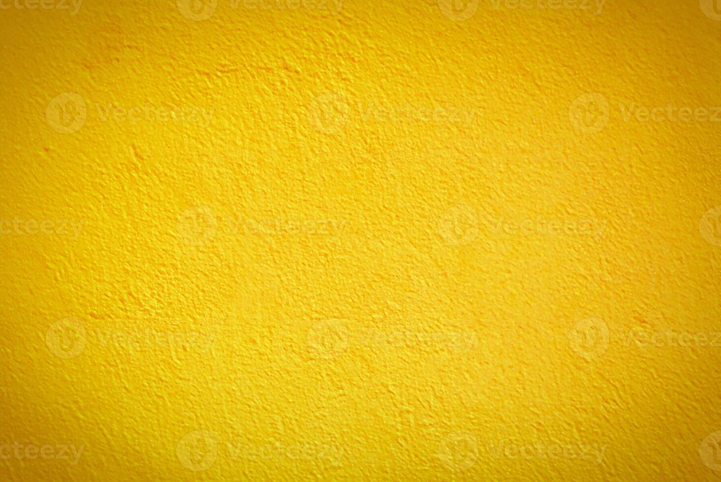 Vibrant Yellow Cement Wall Texture Background for Design Projects photo