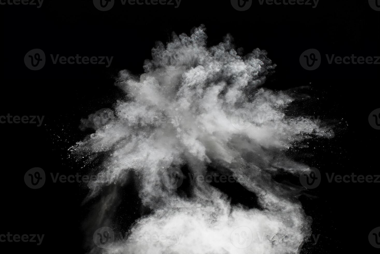 White Powder Explosion, High-Speed Capture of Dust Particles on Dark Background photo