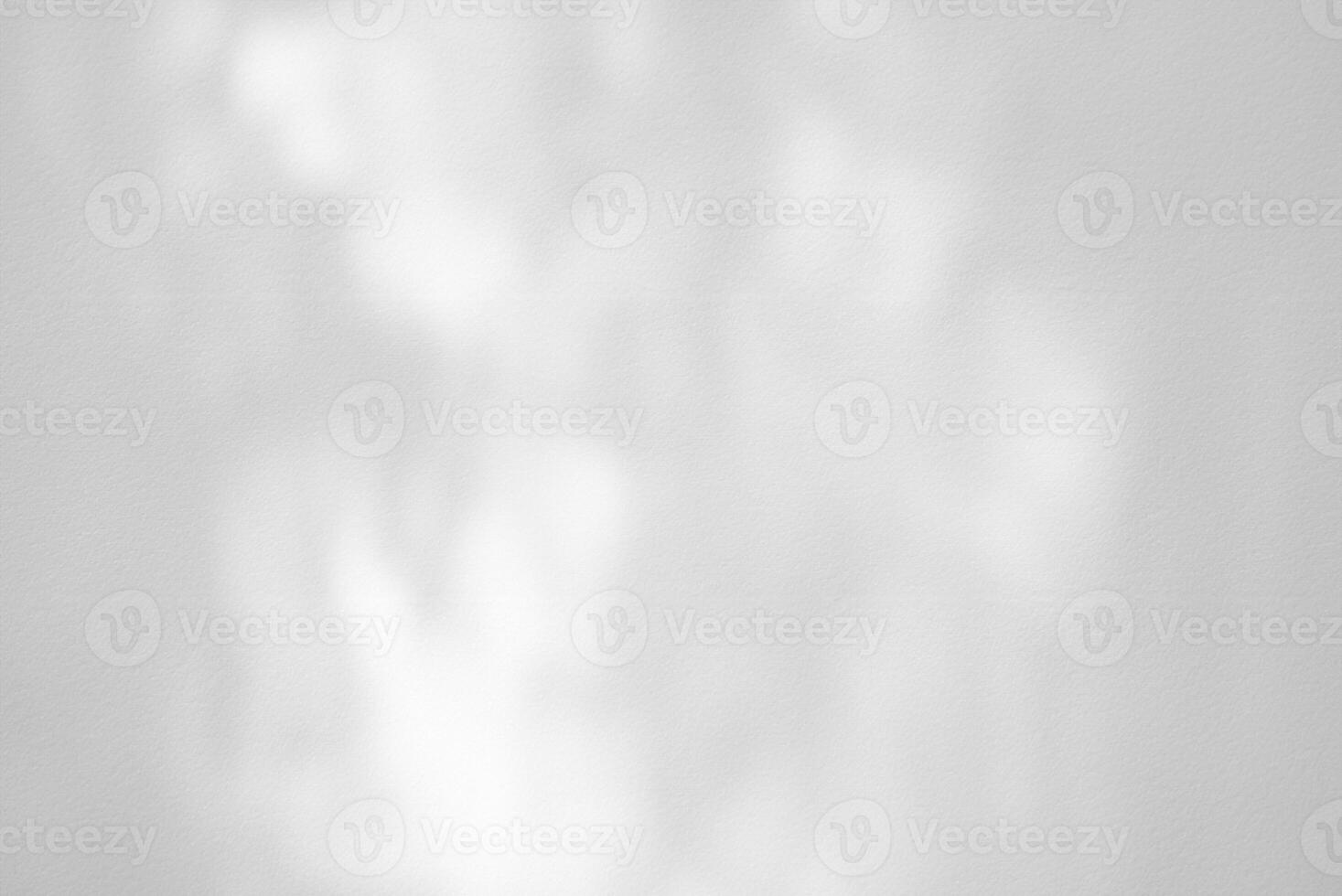 Minimalist White Marble Table with Bush Shadow on Concrete Wall Background, Ideal for Product Presentation, Display, and Mockups photo