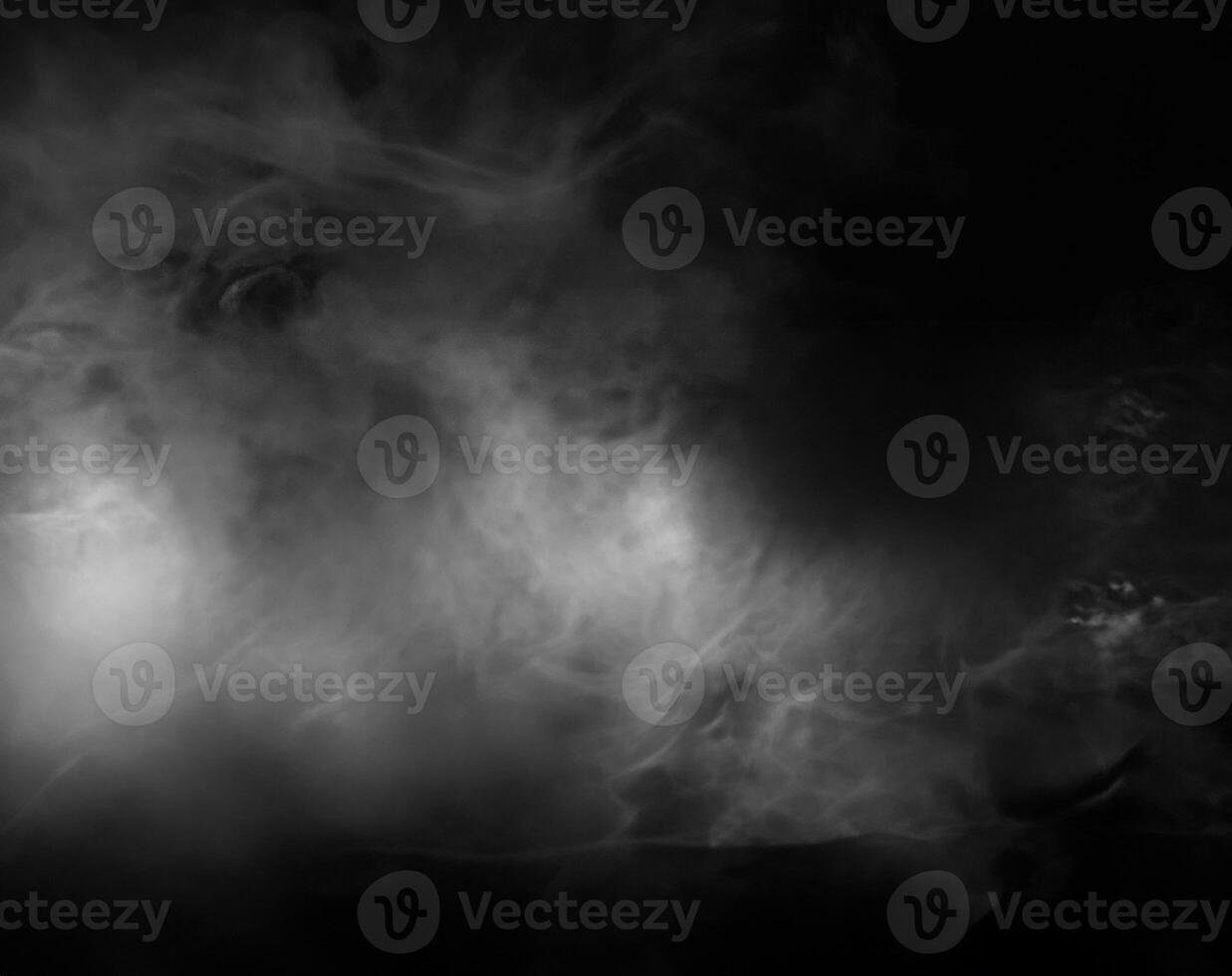 Minimalist Wooden Table with Atmospheric Smoke and Dark Background photo