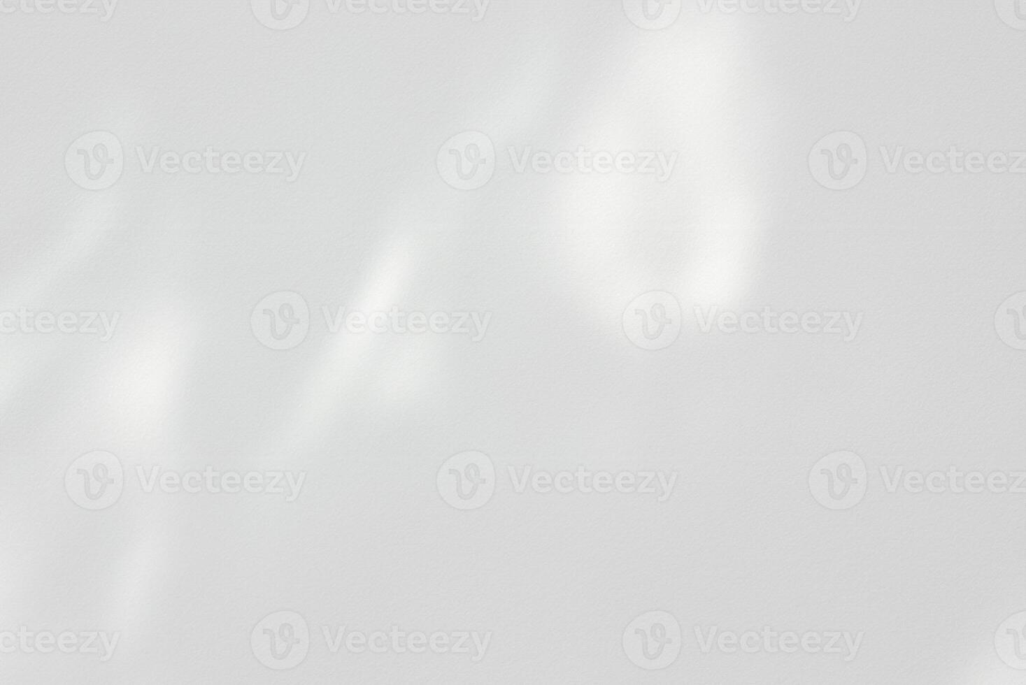 Minimalist White Wood Table with Tree Shadow on Concrete Wall Background, Ideal for Product Presentation, Display, and Mock-ups photo