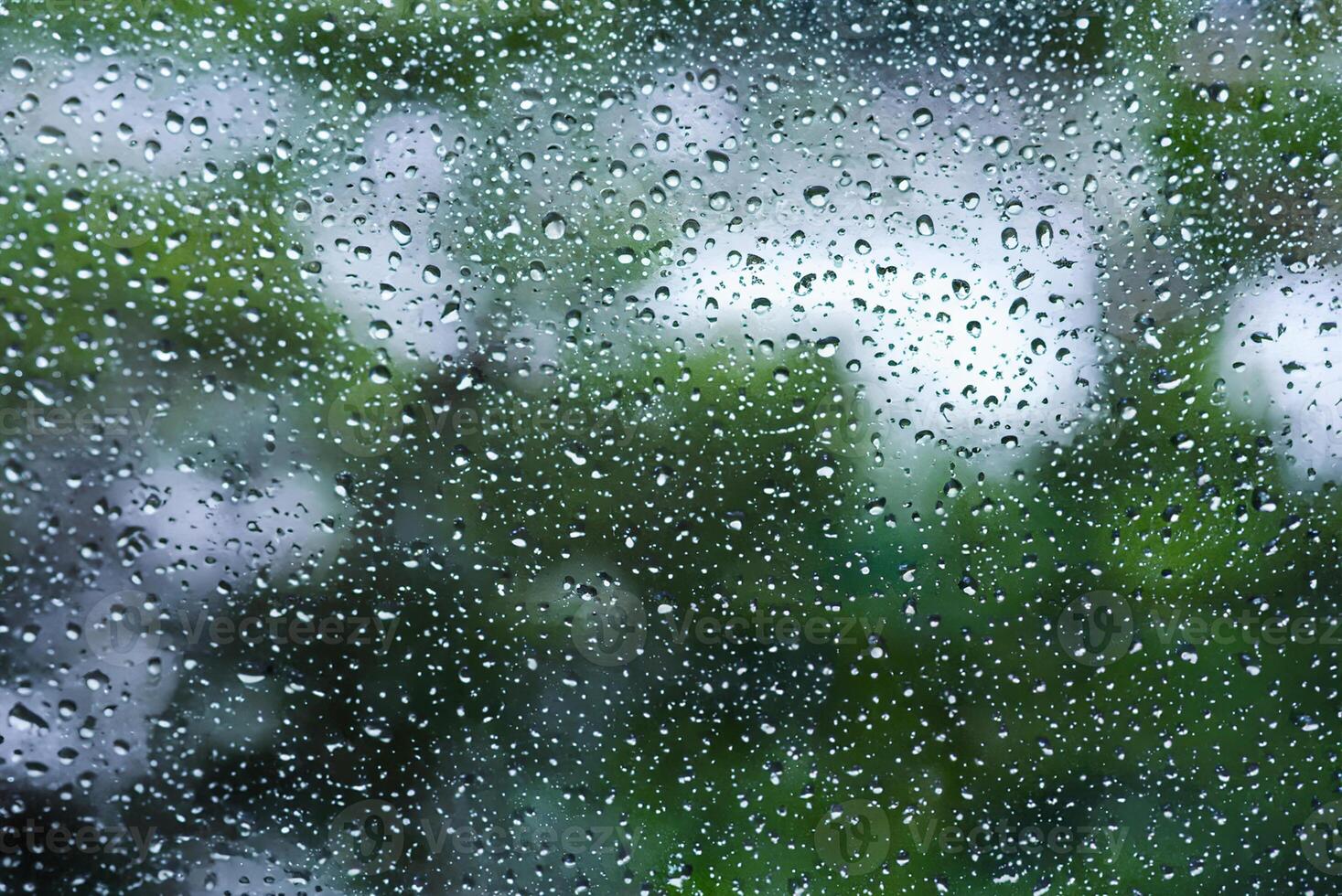 Macro Shot of Raindrop on Frosted Glass Window photo