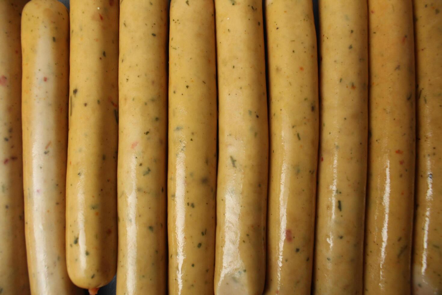 sausages in a package on a gray background. Background of food close-up. Vegans Vegetarian Food photo