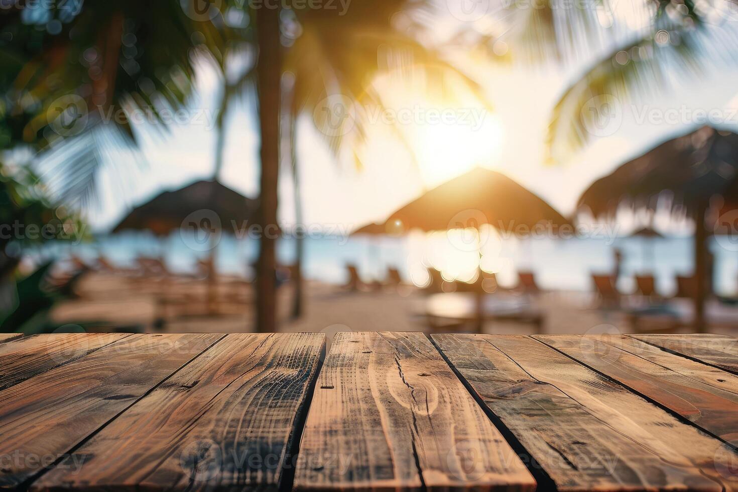 Empty wooden table top with copy space for food drink product advertising with blurred summer resort beach bar restaurant background photo