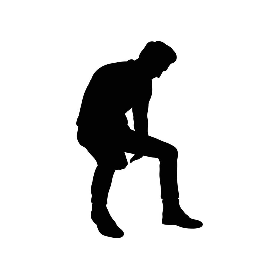 silhouette of a man sitting down on a chair vector