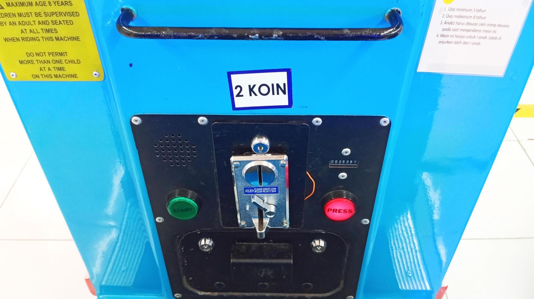 a place to put coins in children's toys photo