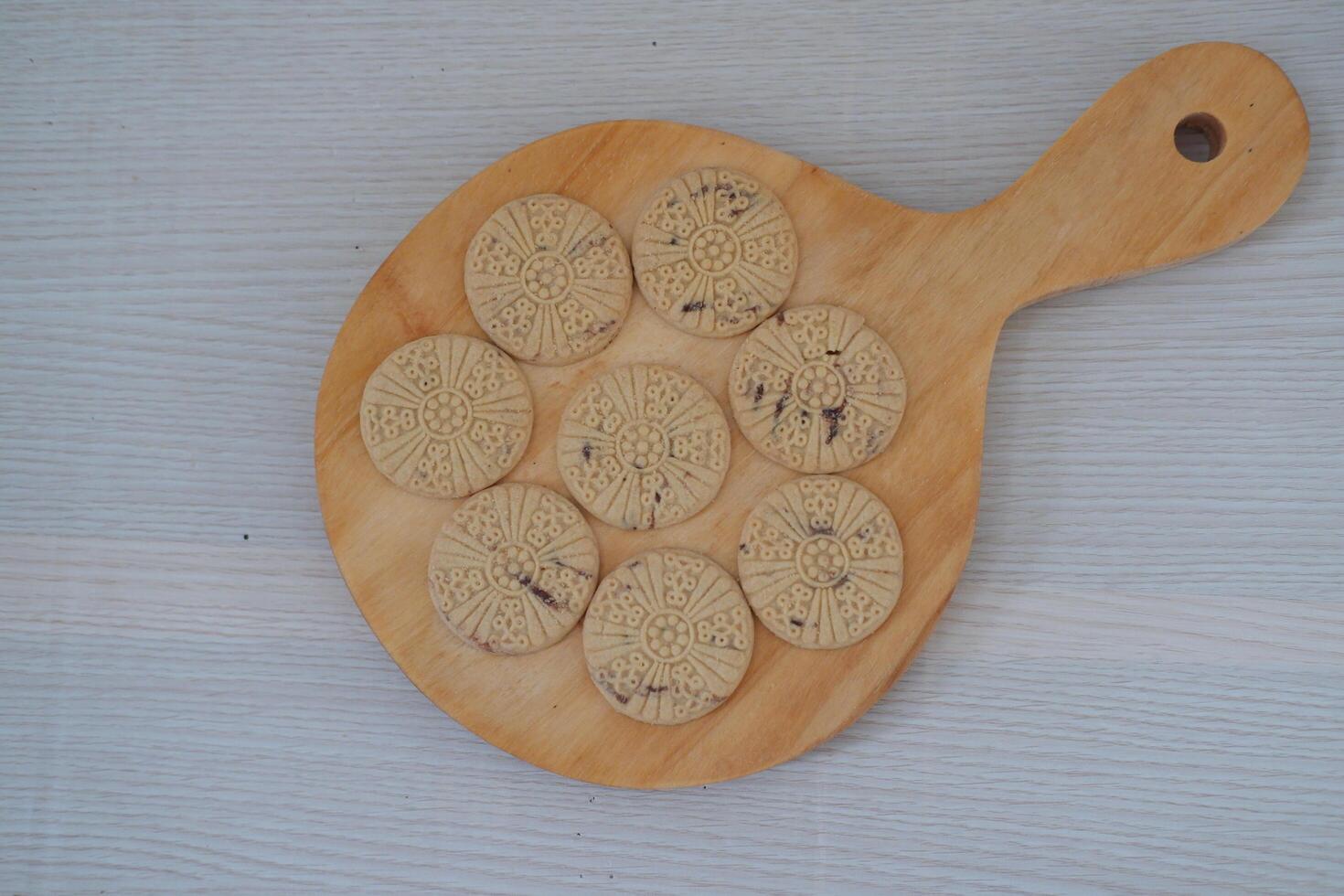 Sandwich cookies on a wooden table. Selective focus, shallow depth of field. photo