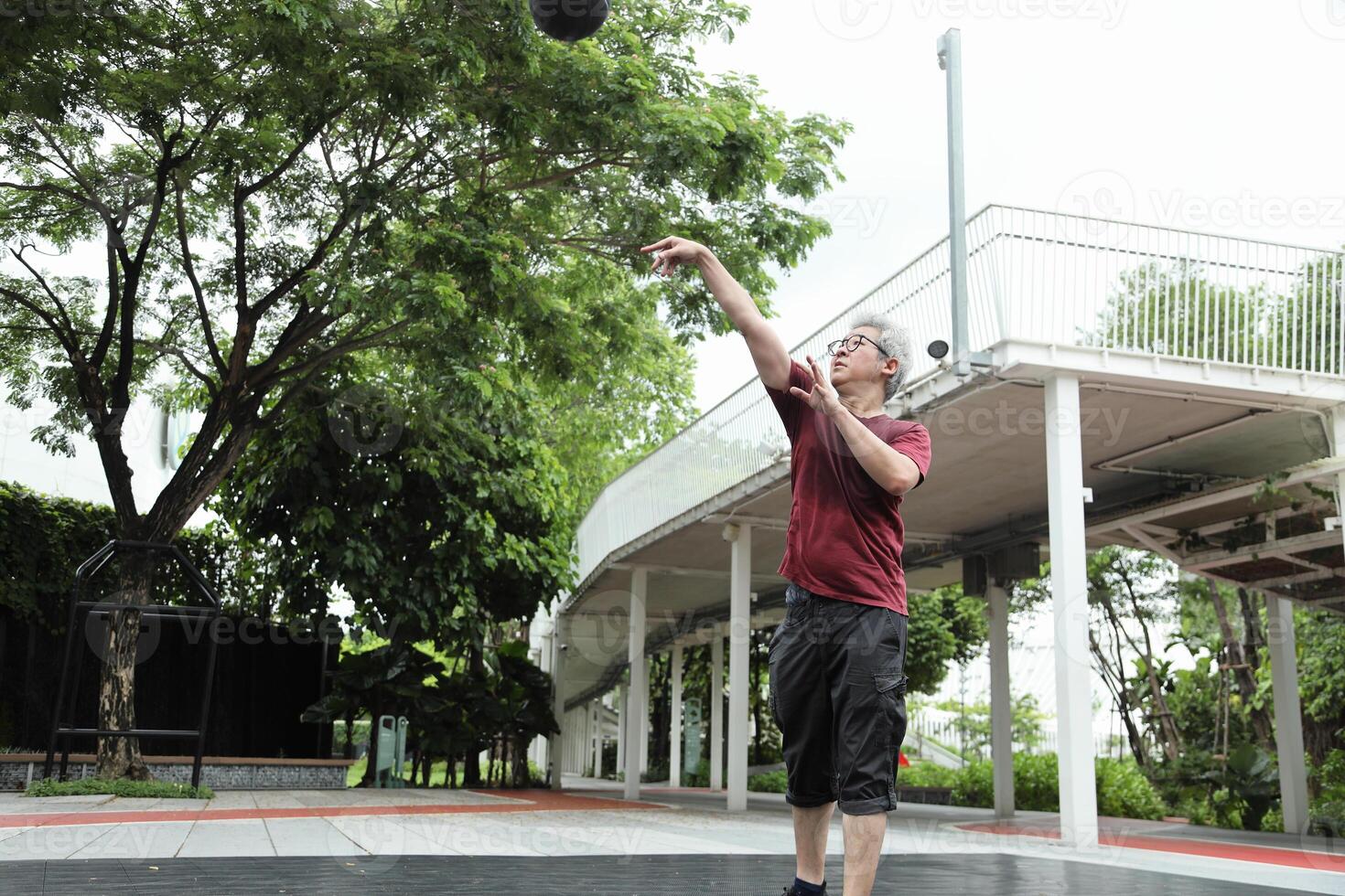 Man playing basketball photo