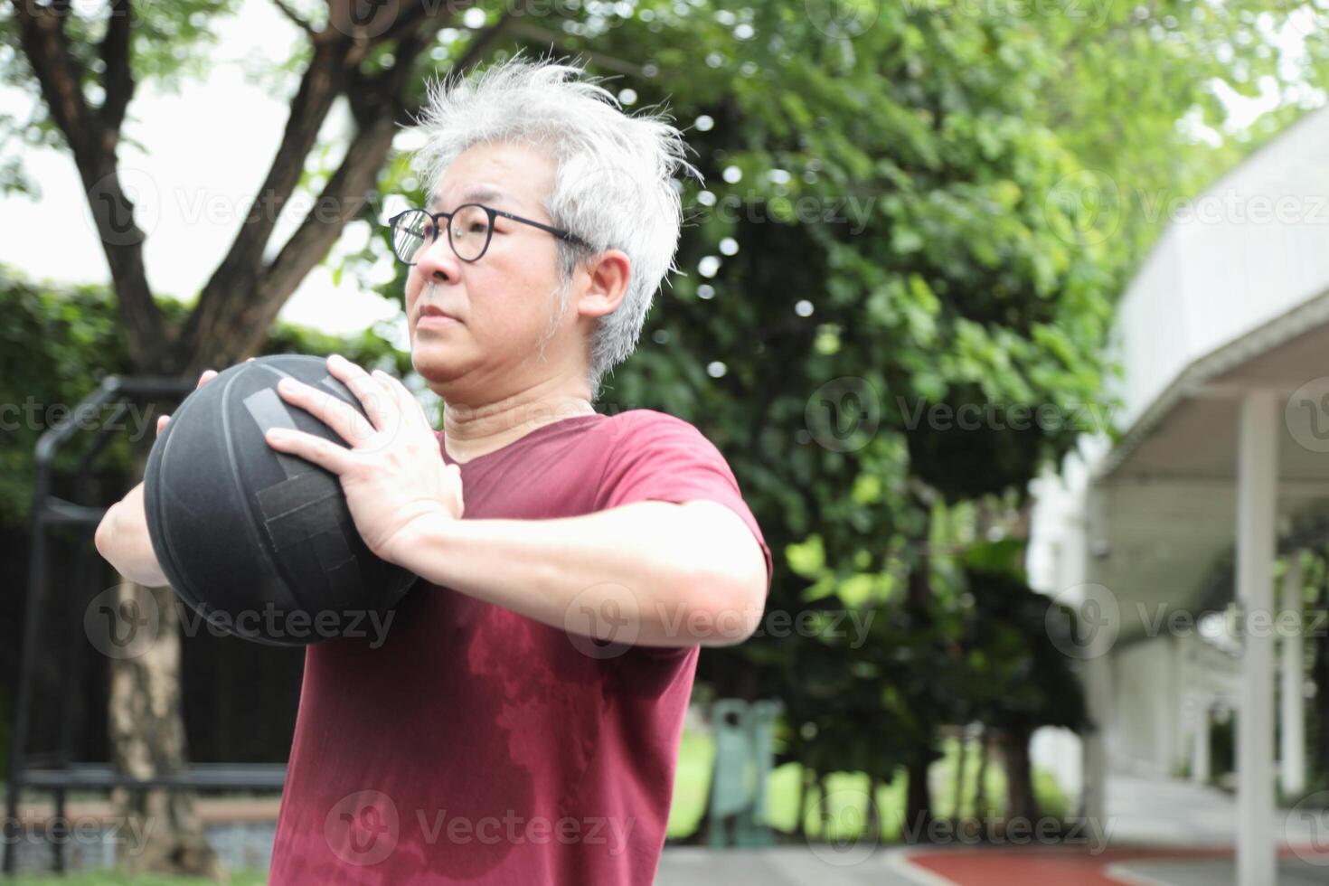 Man playing basketball photo