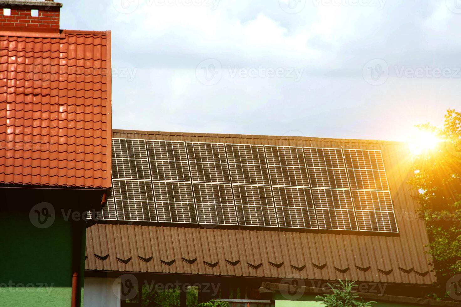 Solar power energy on the roof to a standard house photo