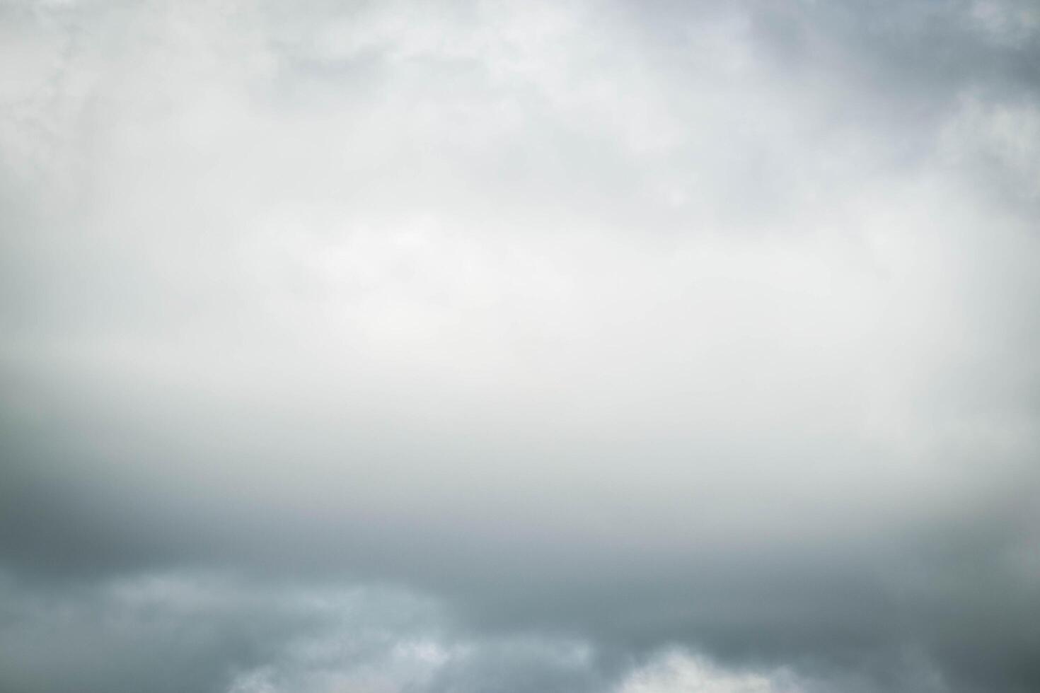 White passenger airplane flying in the sky amazing clouds in the background photo