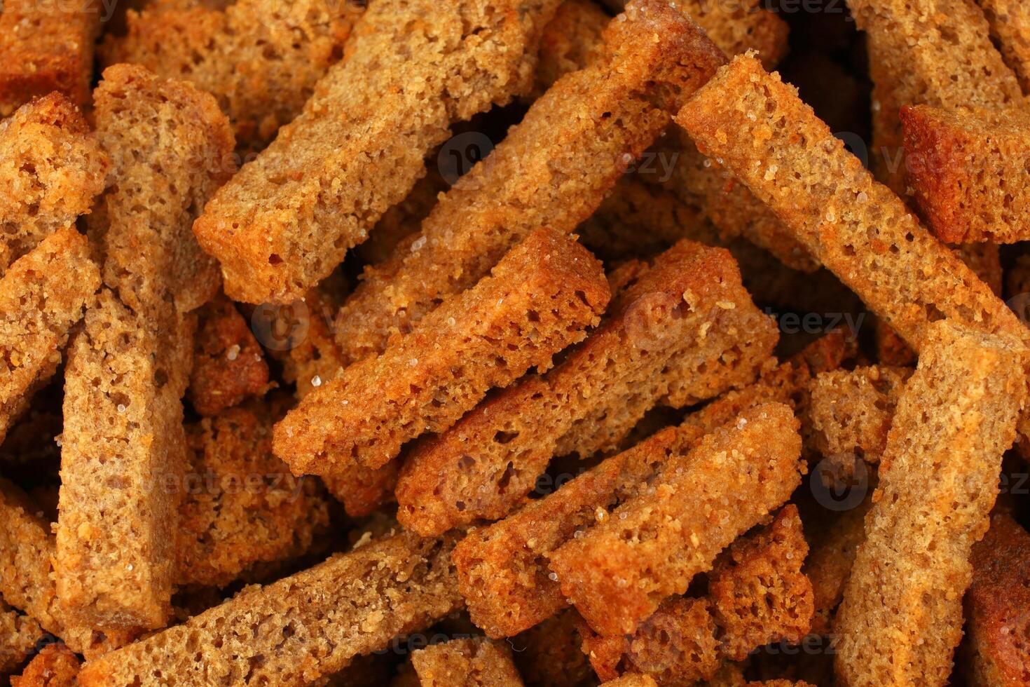 Appetizing snacks. Bread snacks are oblong. Fried bread snacks. photo