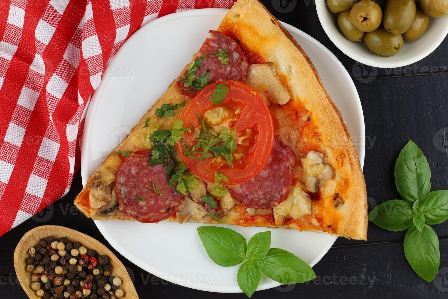 Sliced pizza on the table in the restaurant. photo