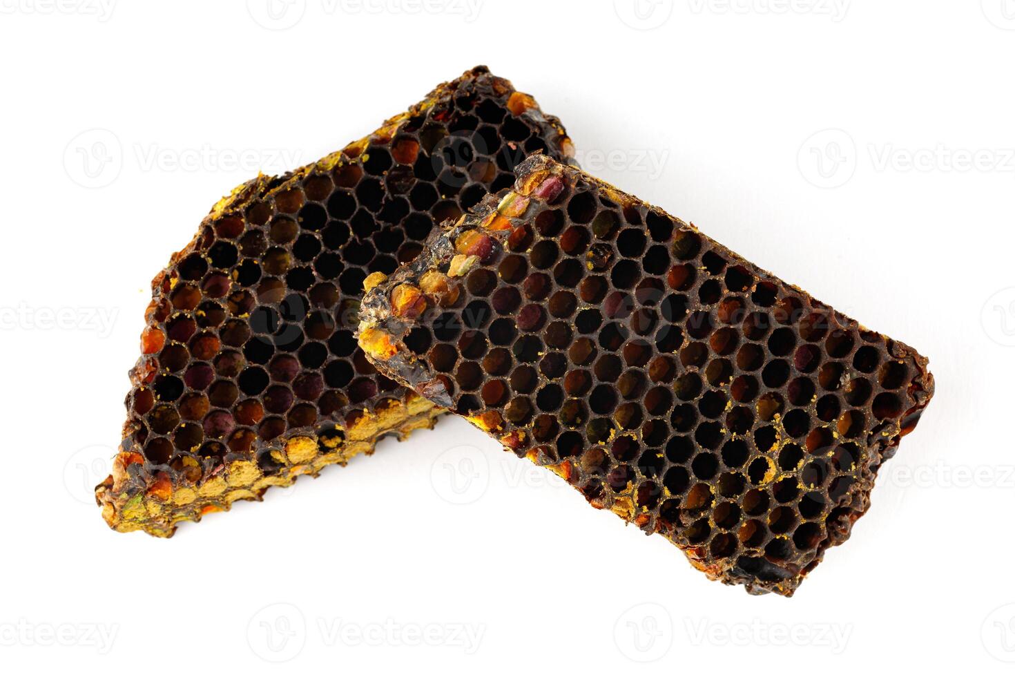 Bee pollen in honeycomb isolates. Bee bread isolated on a white background photo