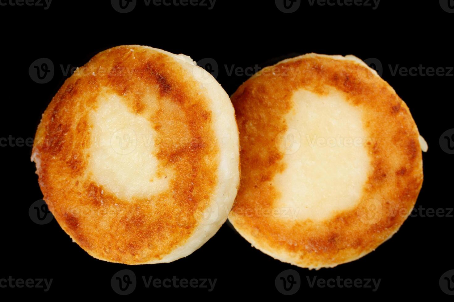 curd fritters Isolate on a black background. photo