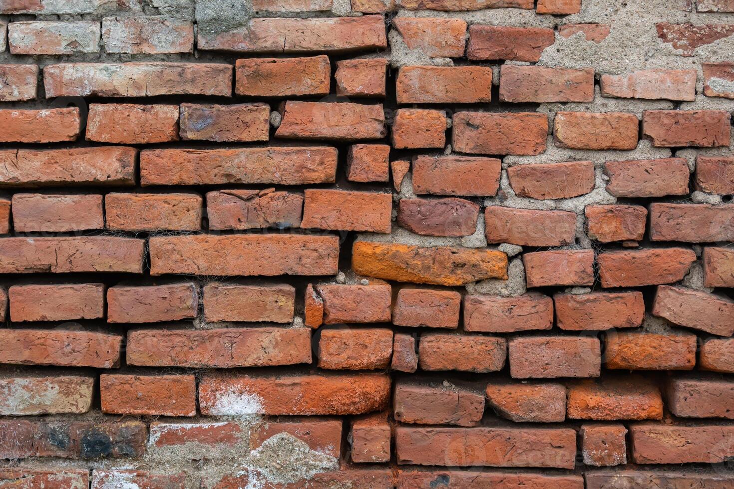 Texture of old ceramic brick wall. photo