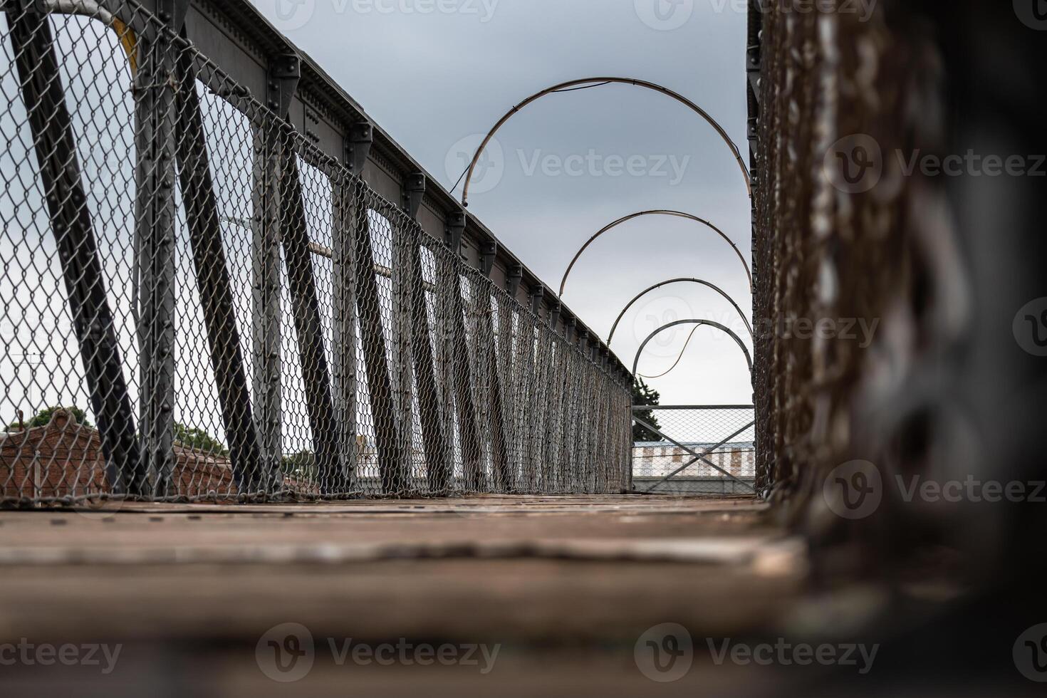 Pedestrian overpass of an abandoned train station. photo