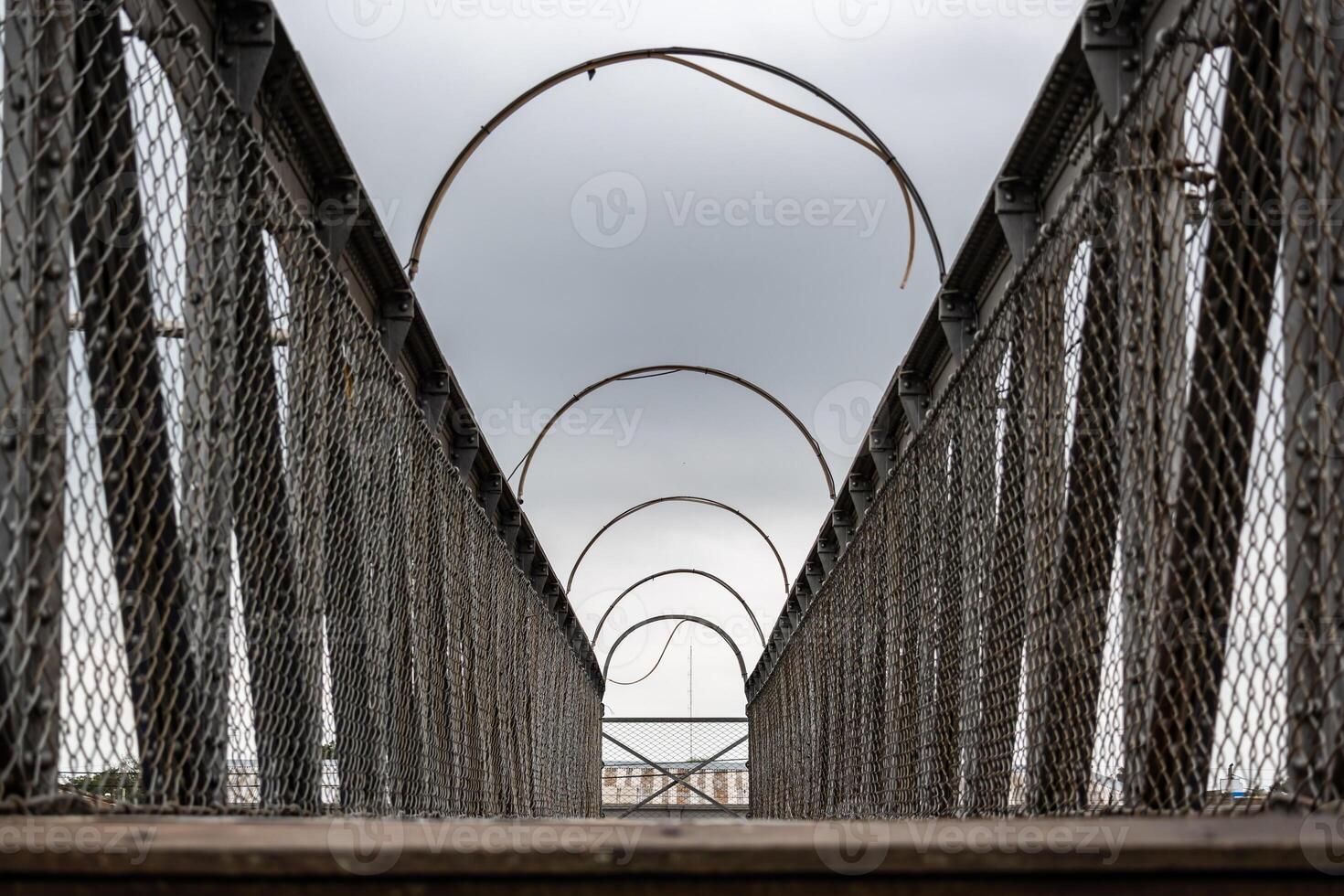 Pedestrian overpass of an abandoned train station. photo