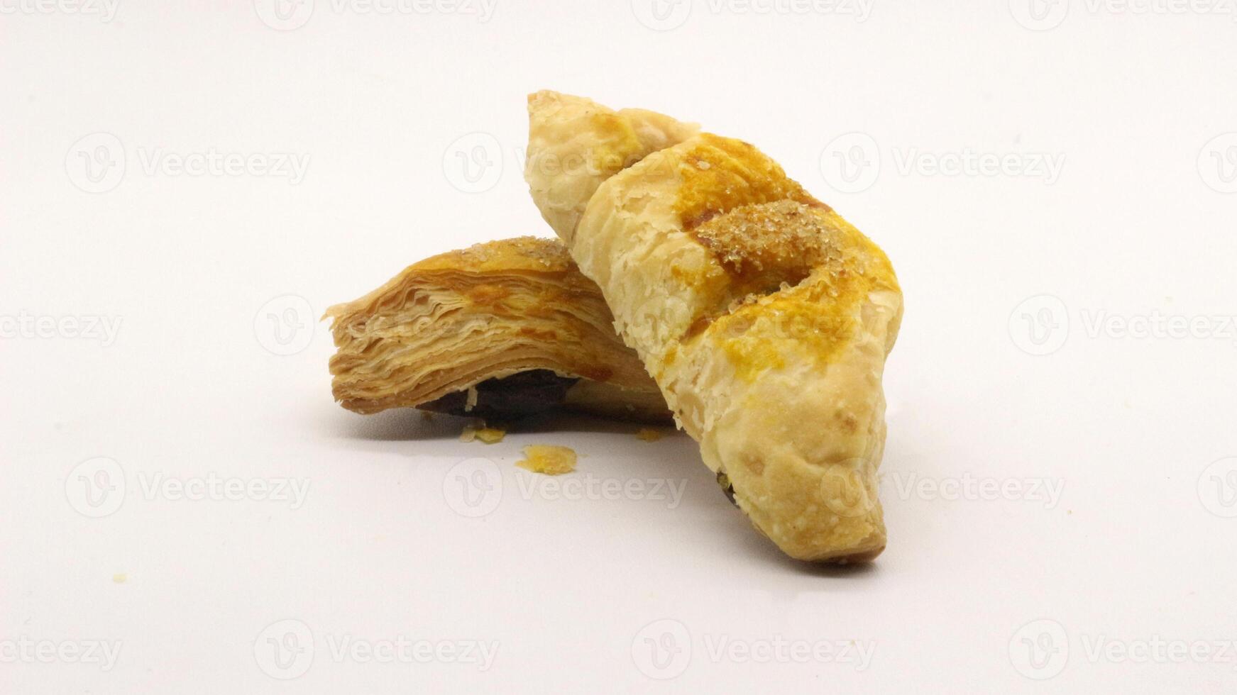 Chocolate pastry cake with a triangular shape photo